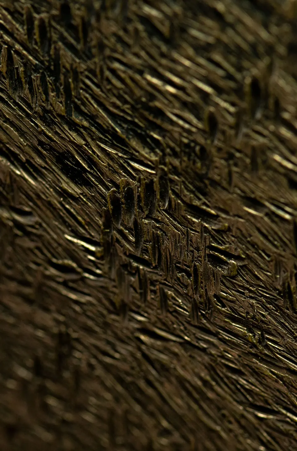Close-up of hand-worked brass surface